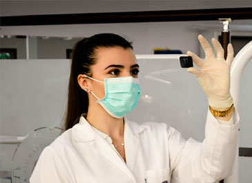 Vital Hospital experienced doctor performing laboratory medical test